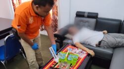 Inafis Sat Reskrim Polres Tanggamus Olah TKP Mayat di Kantor Dinas DPMPTSP