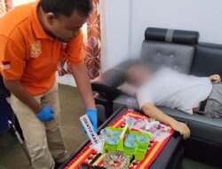 Inafis Sat Reskrim Polres Tanggamus Olah TKP Mayat di Kantor Dinas DPMPTSP